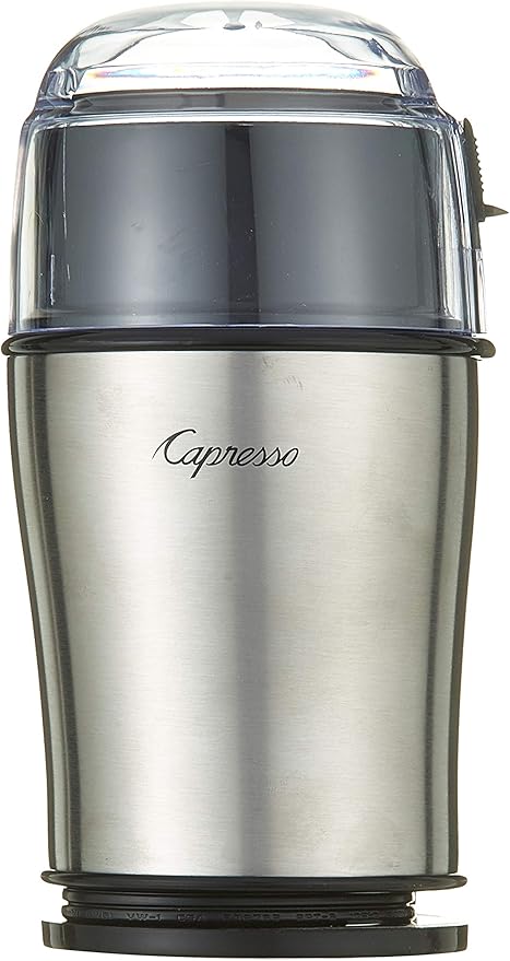 The Capresso grinder with its lid removed, revealing the stainless steel grinding chamber.